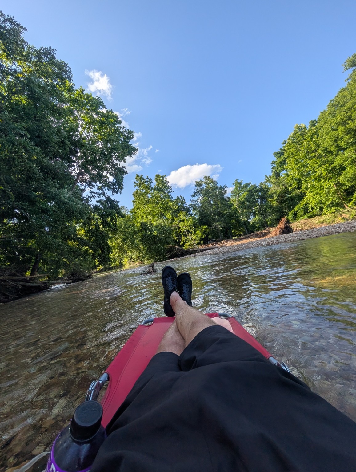 Guest relaxing on a cot in Five Mile Creek